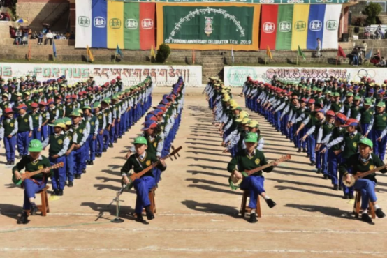 西藏儿童村学校学生在建校59周年庆祝活动上表演传统歌舞 2019年10月23日 照片/Tenzin Pheden/CTA